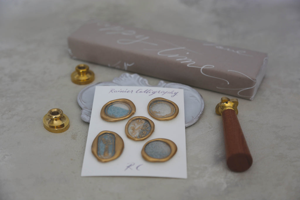 luxury wax seal set of 5 with blue chiyogami screen printed paper and gold gilding horizontal